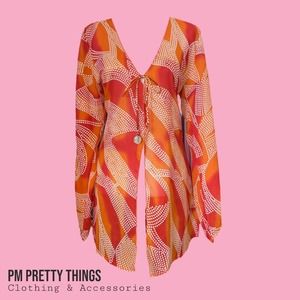 Your best look orange cardigan/cover size large